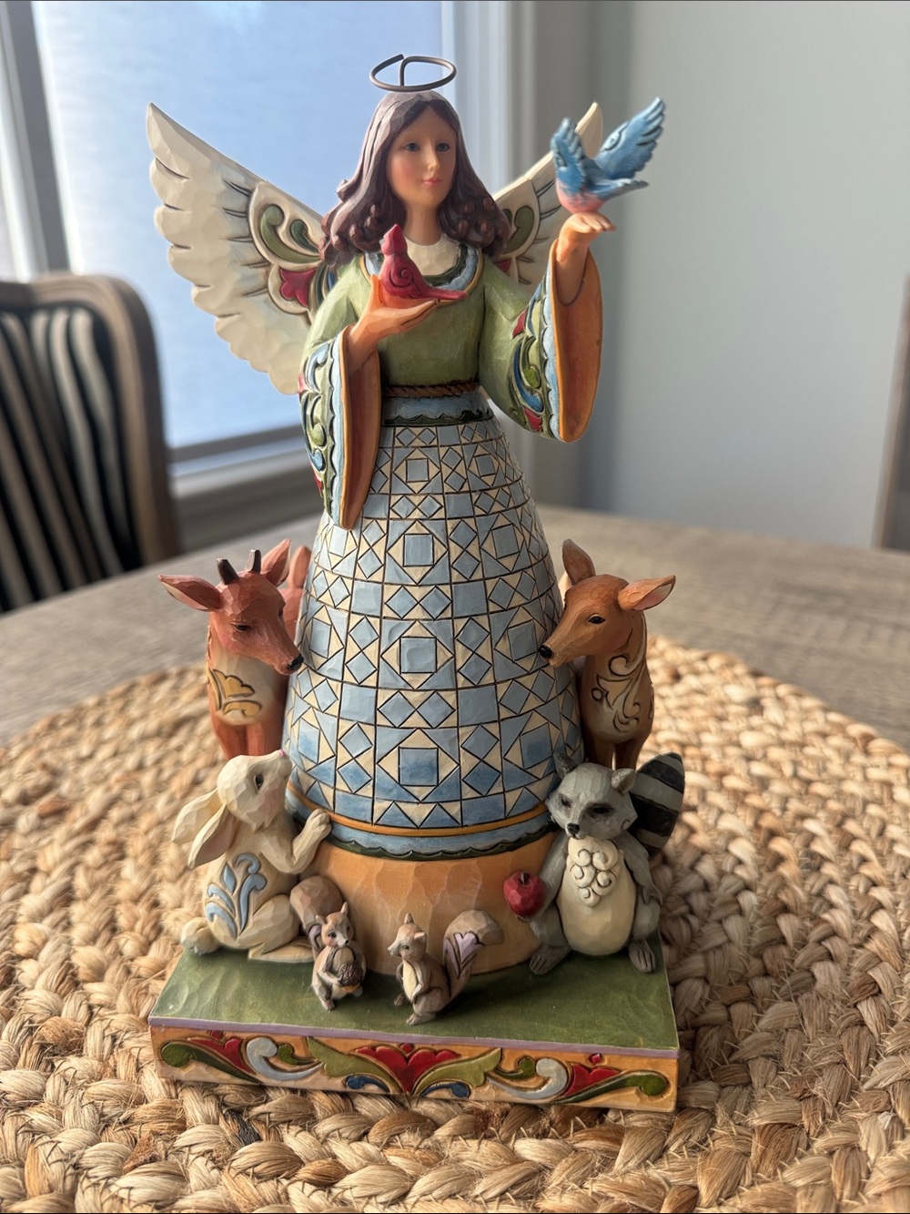 Jim Shore Mosaic-Skirt Angel Surrounded by animals.